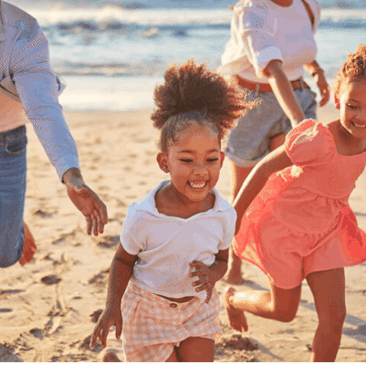 Family enjoying a day together on a Charleston-area beach