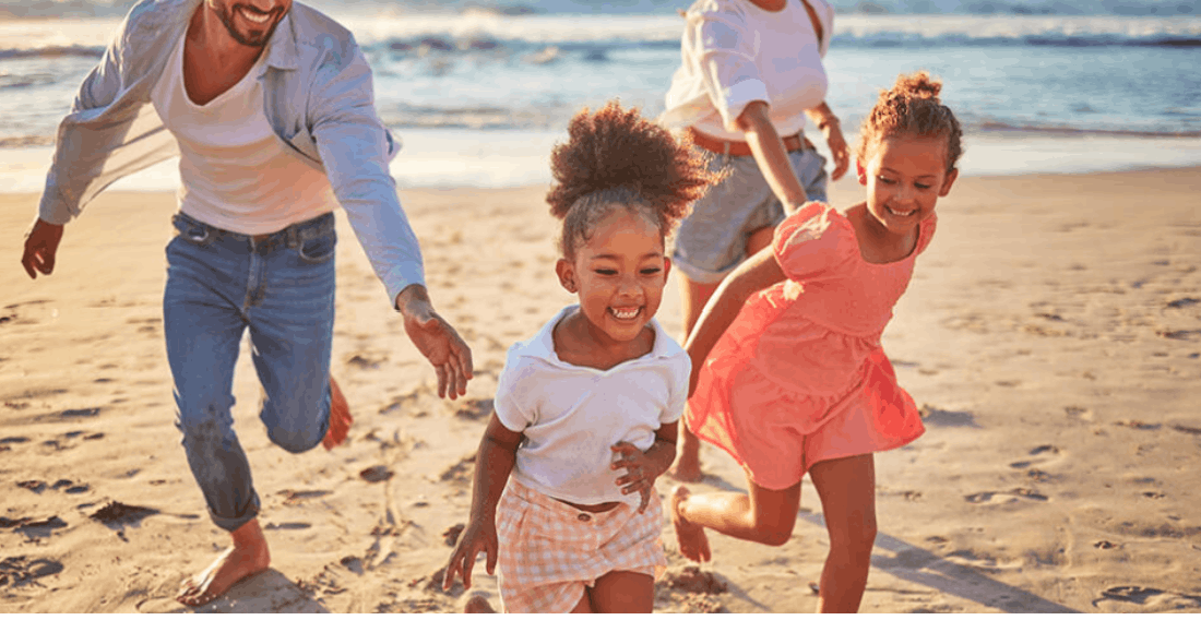 Family enjoying a day together on a Charleston-area beach