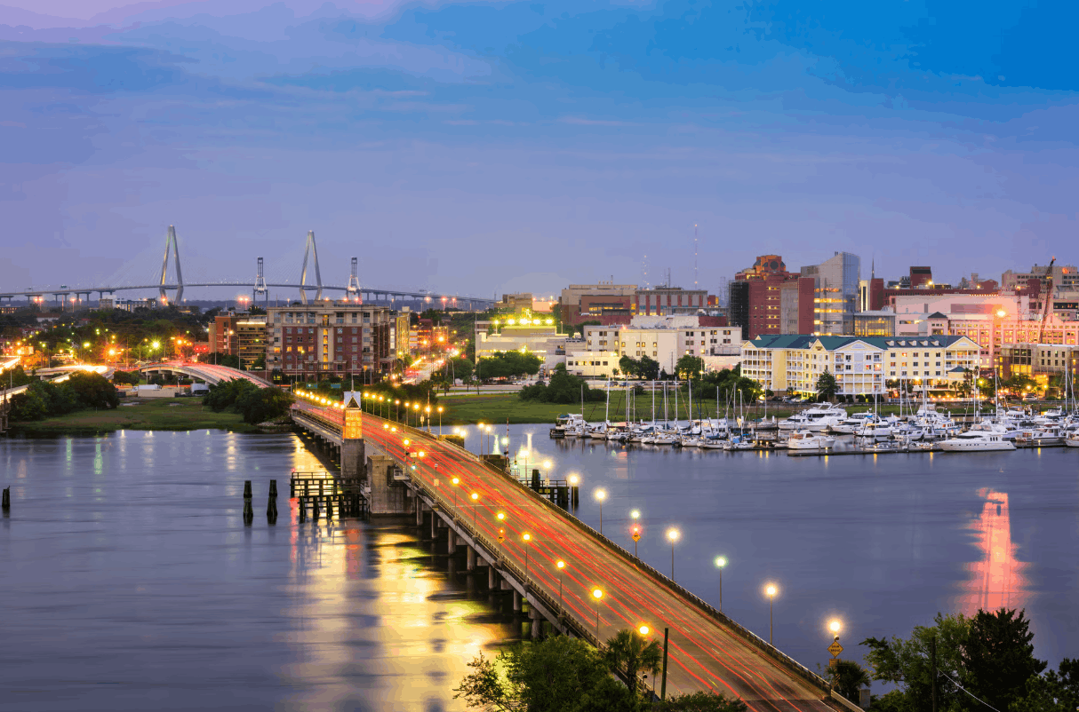 The Ravenel Bridge and the Charleston skyline at dusk