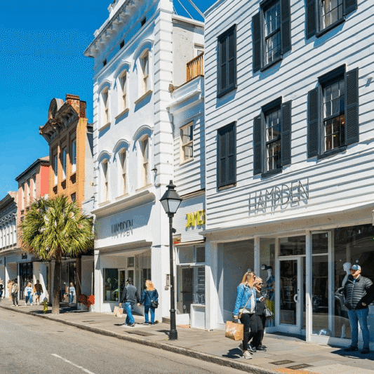 Boutiques and souvenir shops on historic King Street in Charleston, SC, near luxury vacation rentals.