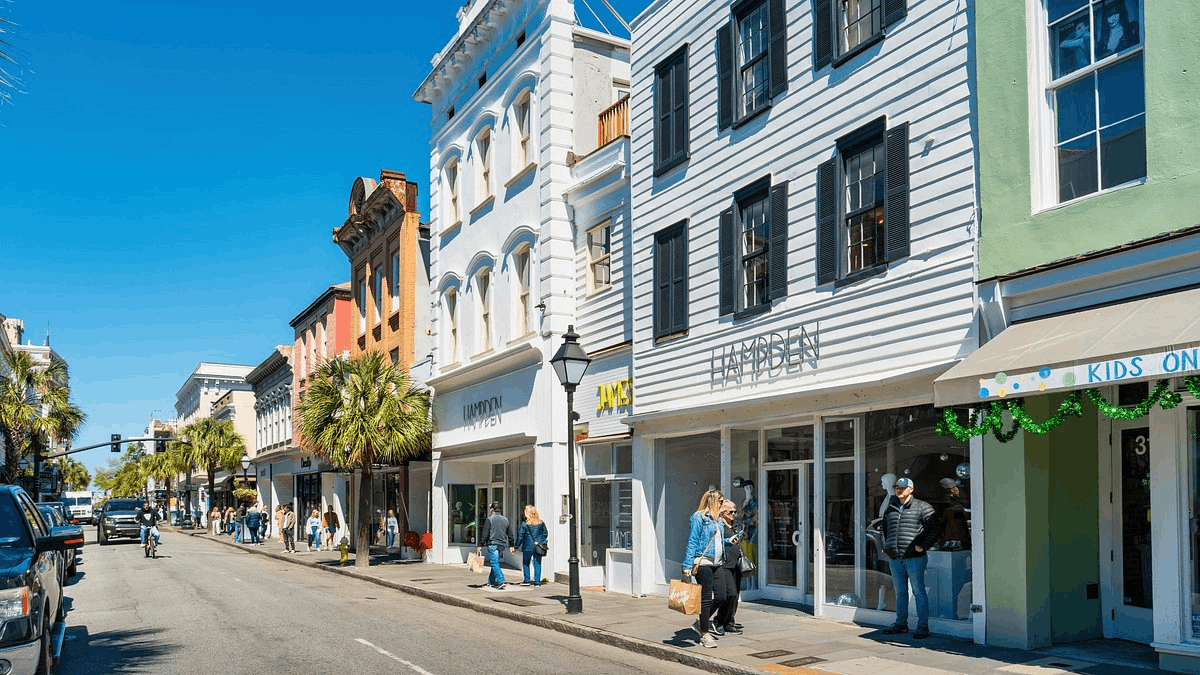 Boutiques and souvenir shops on historic King Street in Charleston, SC, near luxury vacation rentals.